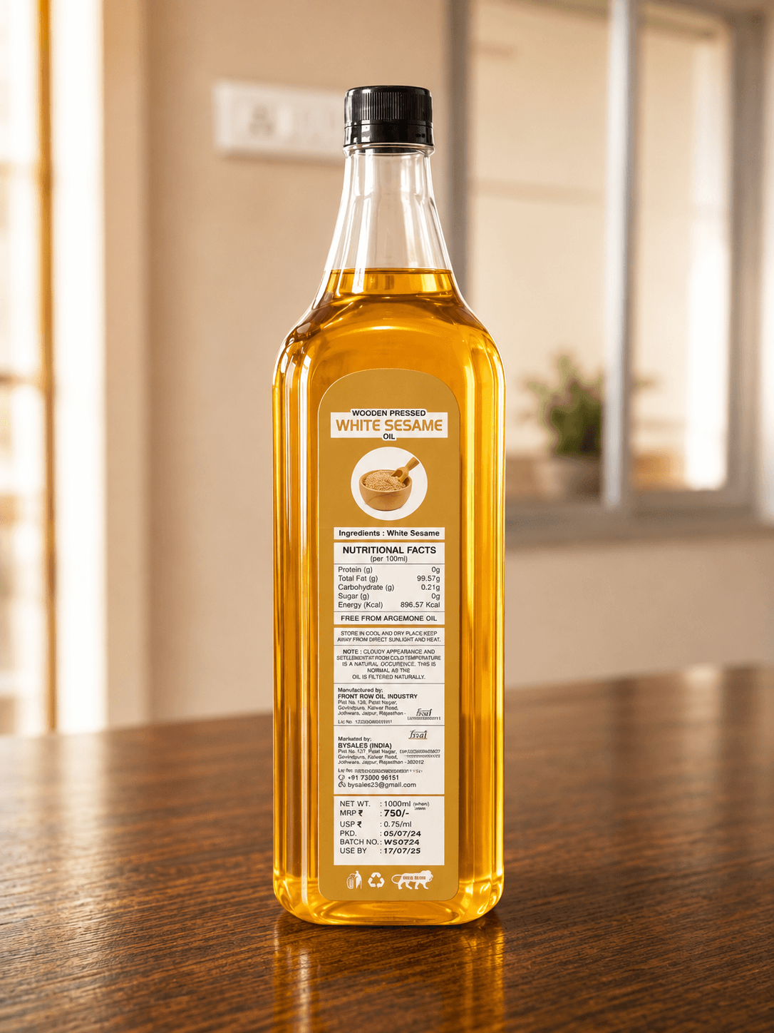 Label details on the back of the white sesame oil bottle
