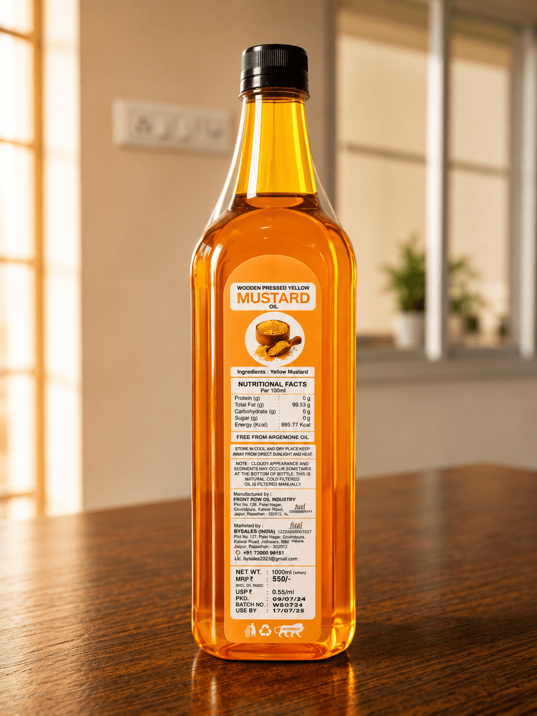 Label details on the back of the yellow mustard oil bottle